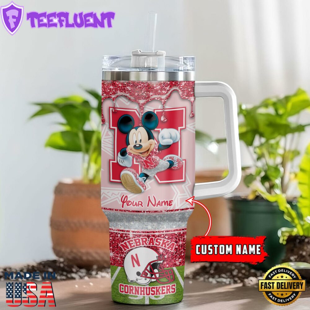 Nebraska Cornhuskers NCAA Mickey Mouse Glitter Custom Stanley Quencher 40oz Stainless Steel Tumbler With Handle