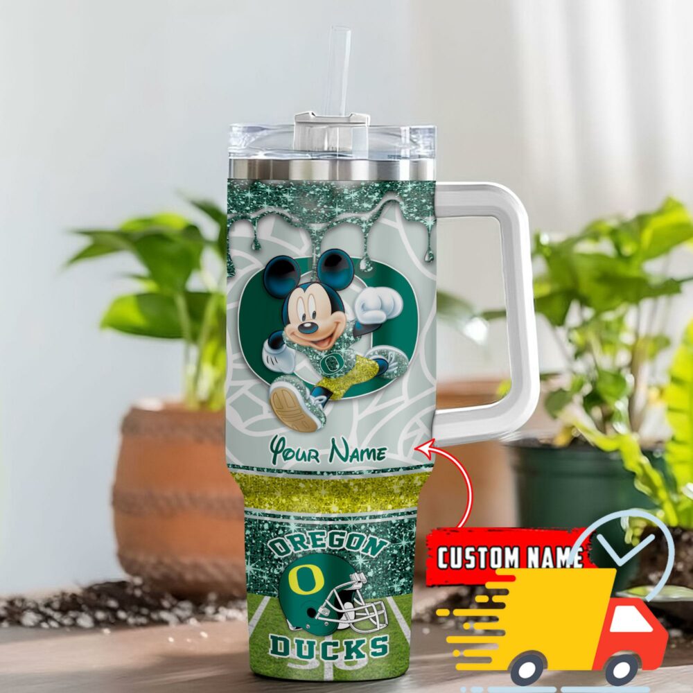 Oregon Ducks NCAA Mickey Mouse Glitter Custom Stanley Quencher 40oz Stainless Steel Tumbler With Handle